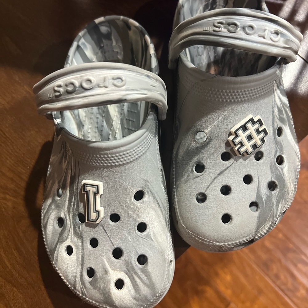 Gray and white Crocs boys size 6 with gems
